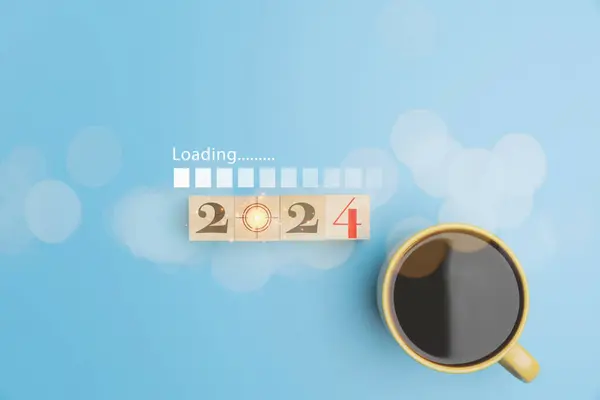2024 Wooden Cube Blocks Coffee Cup Virtual Screen Loading Blue Stock Photo