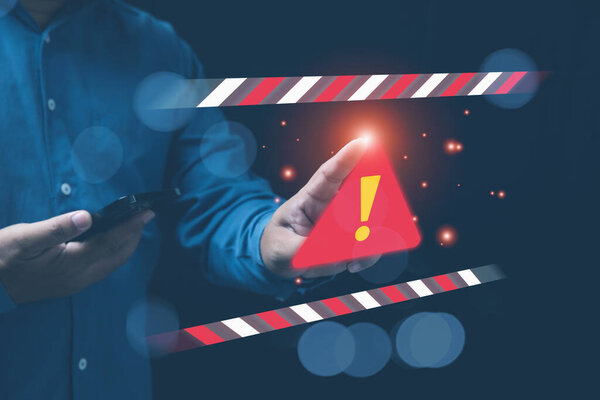 Businessman Holdings Smartphone Touching Warning Sign Notification Error Malicious Software Royalty Free Stock Photos