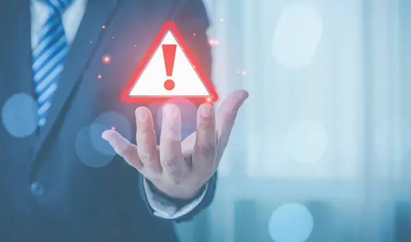Empresario Mostrando Señal Advertencia Precaución Triángulo Rojo Para Error Notificación Fotos De Stock