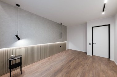 interior design of a room with lighting and floor