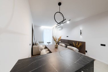 Studio kitchen interior design with kitchen furniture and lighting