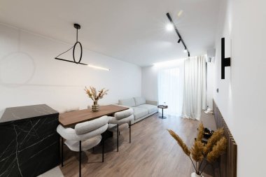 Studio kitchen interior design with kitchen furniture and lighting