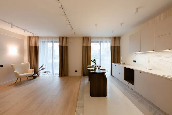stylish new Studio Kitchen with large windows and white walls