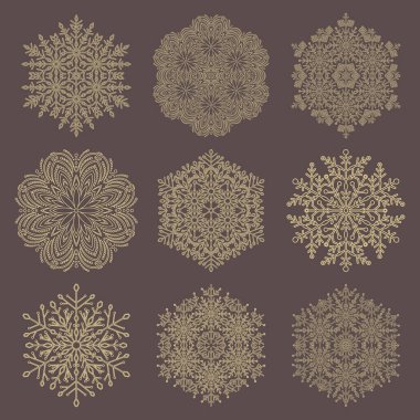 Bir dizi vektör kar taneleri. Kış süsü koleksiyonu. Kar taneleri kahverengi ve sarı koleksiyon. Arkaplan ve tasarımlar için kar taneleri