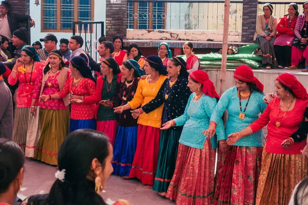 stock image 31st January 2023, Tehri Garhwal, Uttarakhand, India. Traditional Dance and Music festival during a wedding ceremony in the hills of Uttarakhand. People dancing in colorful traditional attire.