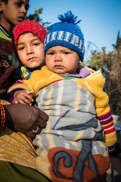 stock image Oct.14th 2022 Uttarakhand, India. North Indian village kids in winter attire, embracing their ethnicity. Cultural diversity and warmth in the winter season.