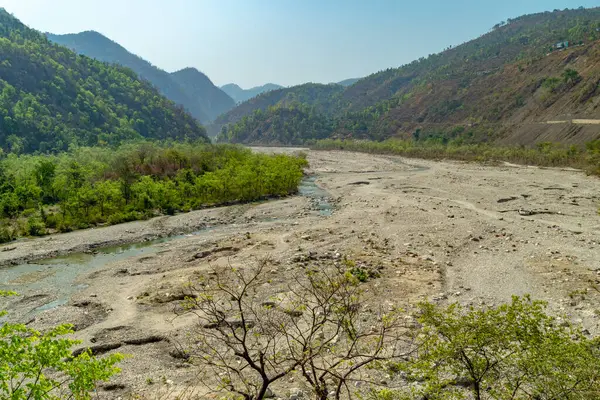 stock image Vast Yamuna River semi-dried during summer at Maldevta region in Dehradun, Uttarakhand, with expansive valleys and mountains