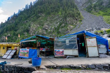 July25th2024, Himachal Pradesh, India. Makeshift temporary arrangements for stay and halts along the trail of the Manimahesh Kailash pilgrimage in the higher Himalayas, Chamba, Himachal Pradesh. clipart