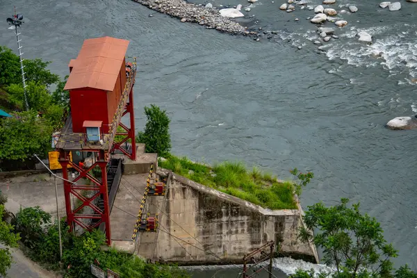 stock image July25th2024, Himachal Pradesh, India. Bypass canal releasing excess water into Ravi River during monsoon in Chamba, Himachal Pradesh, India.