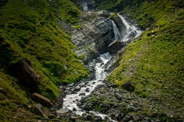 Explore Chamba Valley's stunning glacial rivers and towering Himalayan peaks, including the sacred Mani Mahesh Kailash pilgrimage of Lord Shiva. Himachal Pradesh India. clipart