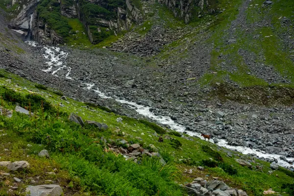 stock image Explore Chamba Valley's stunning glacial rivers and towering Himalayan peaks, including the sacred Mani Mahesh Kailash pilgrimage of Lord Shiva. Himachal Pradesh India.