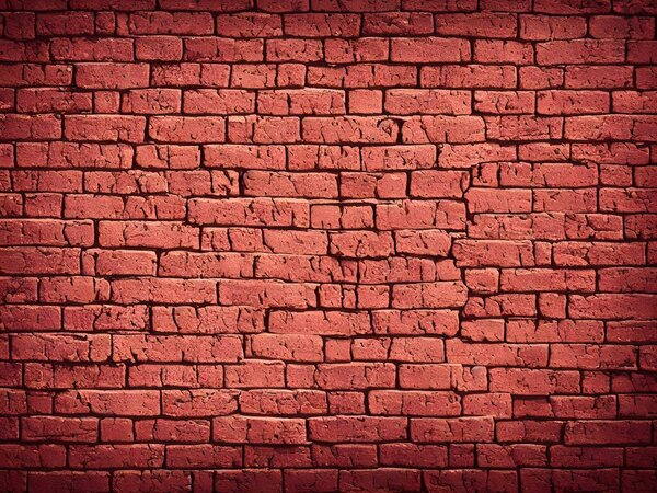 background of old red brick wall with white paint