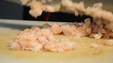 preparing kebab with big knife