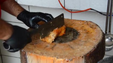 Baked from the Oven is cut into pieces and prepared for serving to the table.
