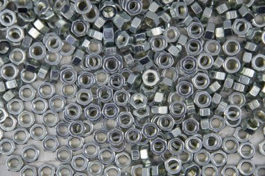 Metal fındık arka planı. İş aletleri. Ögeler düzeltiliyor