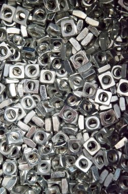 Metal fındık arka planı. İş aletleri. Ögeler düzeltiliyor