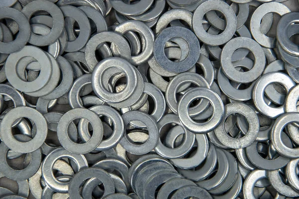 Metal fındık arka planı. İş aletleri. Ögeler düzeltiliyor