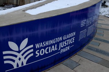 Columbus Ohio January 5, 2025 Washington Gladden Social Justice Park sign showcases community commitment to equality and activism clipart