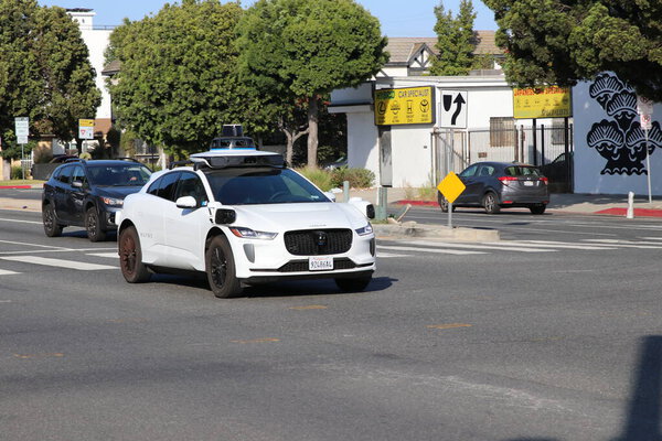Culver City CA  August 12, 2025 Self-driving Waymo car navigates through surburban neighborhood in Los Angeles. 