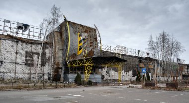 Shopping center in Kherson, Ukraine shelled in destroyed by Russian troops, occupation, war. Fire, damage to civilian infrastructure.