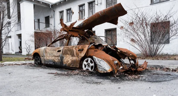 Burnt damaged car of a civilian during the war, Russian attack against Ukraine. War crimes of Russians against the Ukrainian people, genocide. Kherson