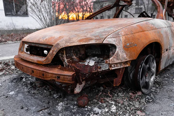 Burnt damaged car of a civilian during the war, Russian attack against Ukraine. War crimes of Russians against the Ukrainian people, genocide. Kherson