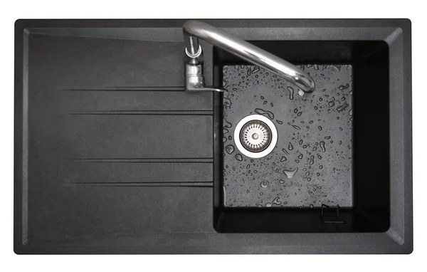 New granite kitchen sink black wash flat lay. After. Drops water. House cleaning service. Top view.