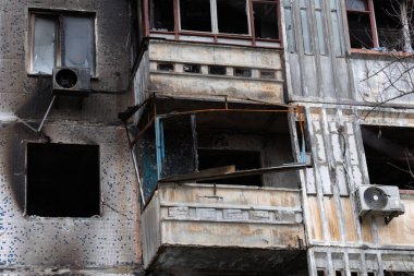 Artillery shelling by Russians of an apartment building of civilian infrastructure in Kherson, Ukraine, genocide of the Ukrainian people. Russia's war crimes against the Ukrainian civilian population