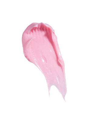 İzole edilmiş beyaz arka planda yüz ve vücut için pembe krem veya kil, kaolin veya ruj dokusu. İfadeleri at.