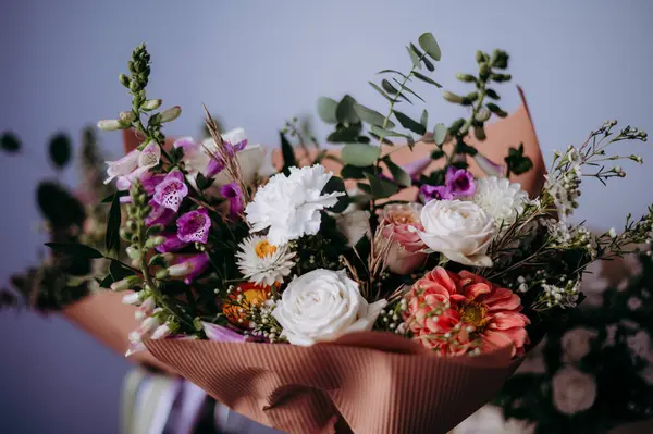 a bouquet of flowers in a wrap