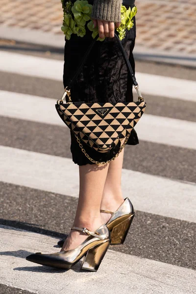 stock image Milan, Italy - September, 22, 2022: woman wearing triangular print pattern Symbole Mini bag from Prada, street style outfit details