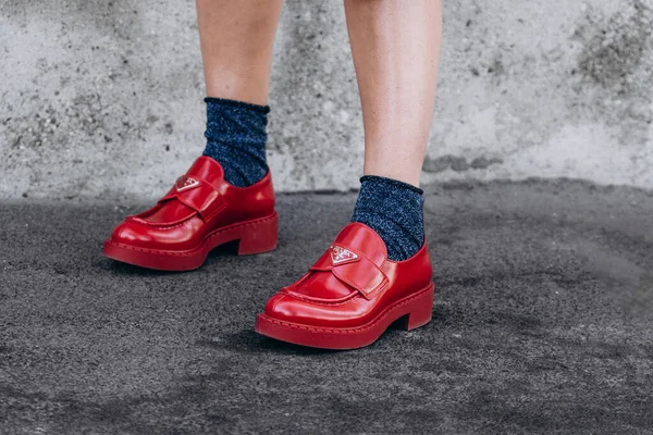 stock image Milan, Italy - January, 13, 2023: woman wears logo loafers plain leather loafers Prada, street style details