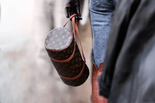 stock image Milan, Italy - February, 25, 2024: woman wears Louis Vuitton bag, fashion blogger outfit details, street style