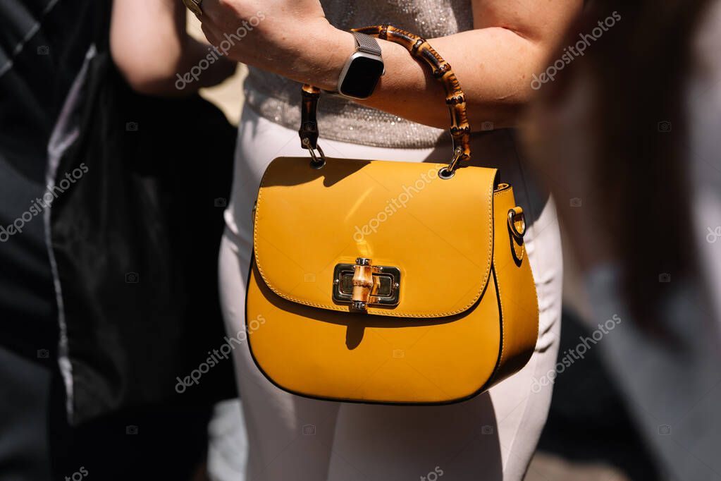 Milan, Italy - June, 16, 2023: woman wears Gucci bag, fashion blogger outfit details, street style