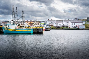Bonavista Newfoundland Kanada, 24 Eylül 2022: Balıkçı tekneleri ve uzak Ryan Premises Ulusal Tarih Bölgesi Kanada 'nın doğu kıyısı boyunca uzanan Kanada mirası.