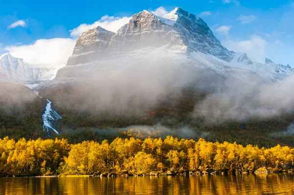 stock image Mountains with fresh snow above autumn landscape