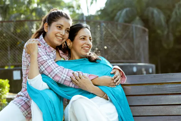 stock image Portrait of happy indian daughter hugging her mother ,Mother and daughter Friends Concept