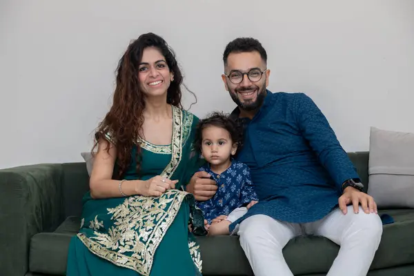 Stock image Portrait of Indian couple in Traditional wear sitting on sofa