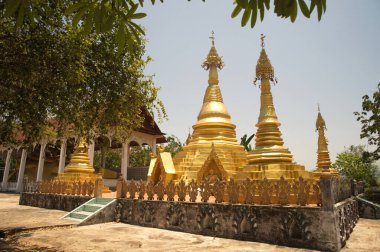 Golden Pagoda at Wat Somdet, a historic site in Amphoe Sangkhlaburi, Kanchanaburi Province ,Thailand. A combination of Thai-Raman and Burmese art. 