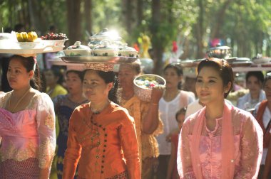 KANCHANABURI ,THAILAND - APRIL 17, 2016 :Thai food parade to eat sweet and savory food that Thai Mon minority people bring to the Wat Wangwiwegaram at Amphoe Sangkhlaburi, Kanchanaburi Province in Songkran festival, Middle of Thailand.
