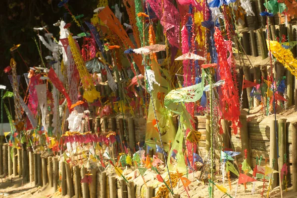 stock image A pagoda made of sand and colorful flags are planted at Wat Wang Wiwekaram,Sangkhlaburi District , Kanchanaburi Province in Songkran festival in Thailand.  