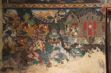 Wat Kongkharam Mon 'daki kilisenin içindeki duvar resmi, resmin rengi doğal renktir. O günlerde ağaç kabuğundan ve çiçeklerden çıkarılan tablo, yaklaşık 250 yıllık Buda' nın tarihi hakkında yazmıştır. Tayland 'da..