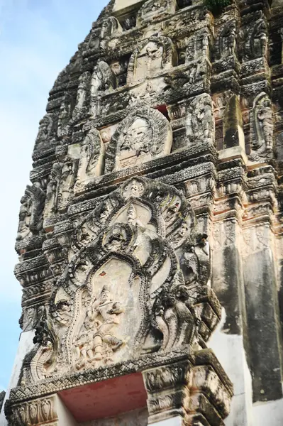 Buddhist art pattern stucco on the Main Prang of Wat Mahathat Worawihan. It is an architecture built in the 18th century. Located at Ratchaburi Province in Thailand.
