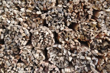 Ahşap yığınının yüzeyinin dokusu ve arka planı. Kesilmiş odun yığını. Kırsal ahşap dokusu yüzey ve yapı.