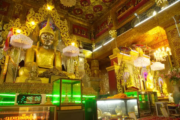 stock image Large golden seated Buddha image is the main Buddha image and Phra Mahamuni in the Mahamuni Phrya  Temple Church. It is located on the Rakhine State , Myanmar.