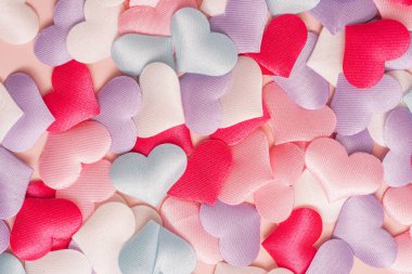 Background of small multi-colored hearts.