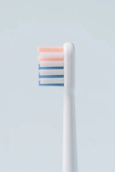 Elektrische Zahnbürste Profil Vor Blauem Hintergrund — Stockfoto