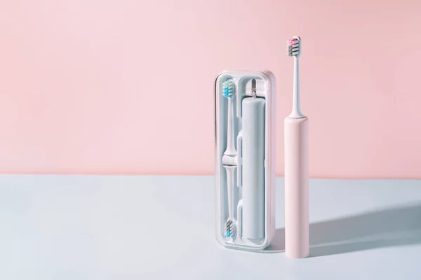 Electric Toothbrush Special Container Blue Pink Background — Stock Photo, Image