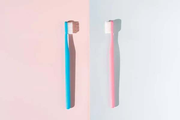 Blue Pink Toothbrush Pink Blue Background Hard Light — Stock Photo, Image
