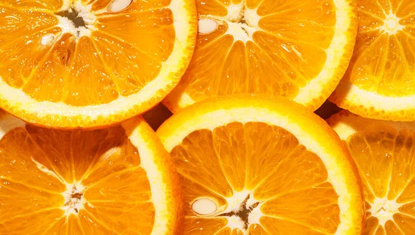 Kerek Narancssárga Szeletek Háttere Makrofotózás — Stock Fotó
